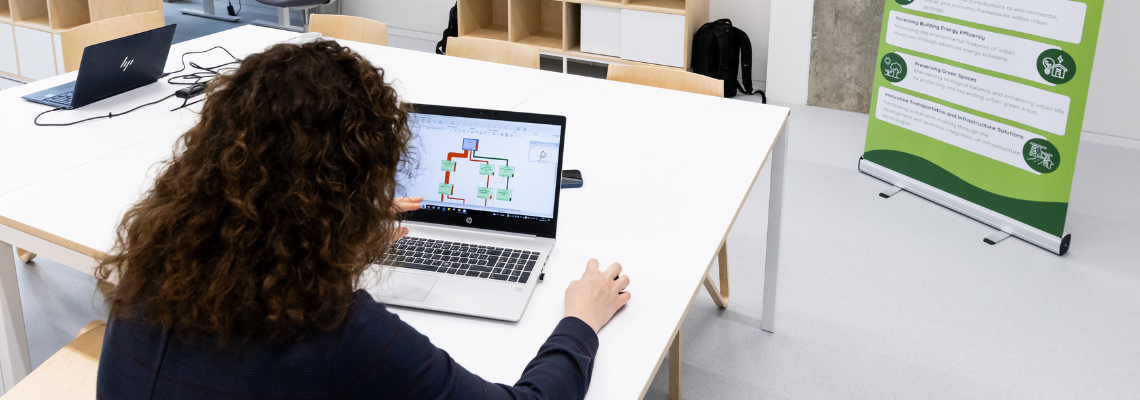 City Systems LAB woman working with a computer