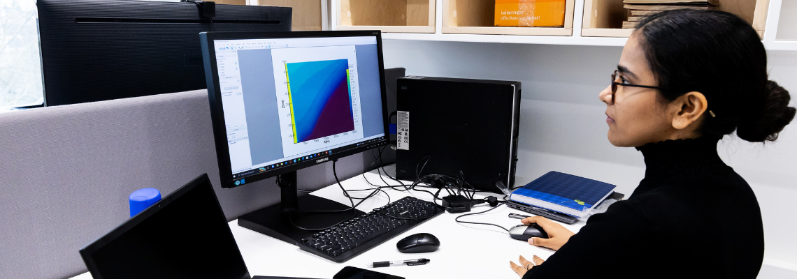 GeoEnergy LAB woman working with a computer